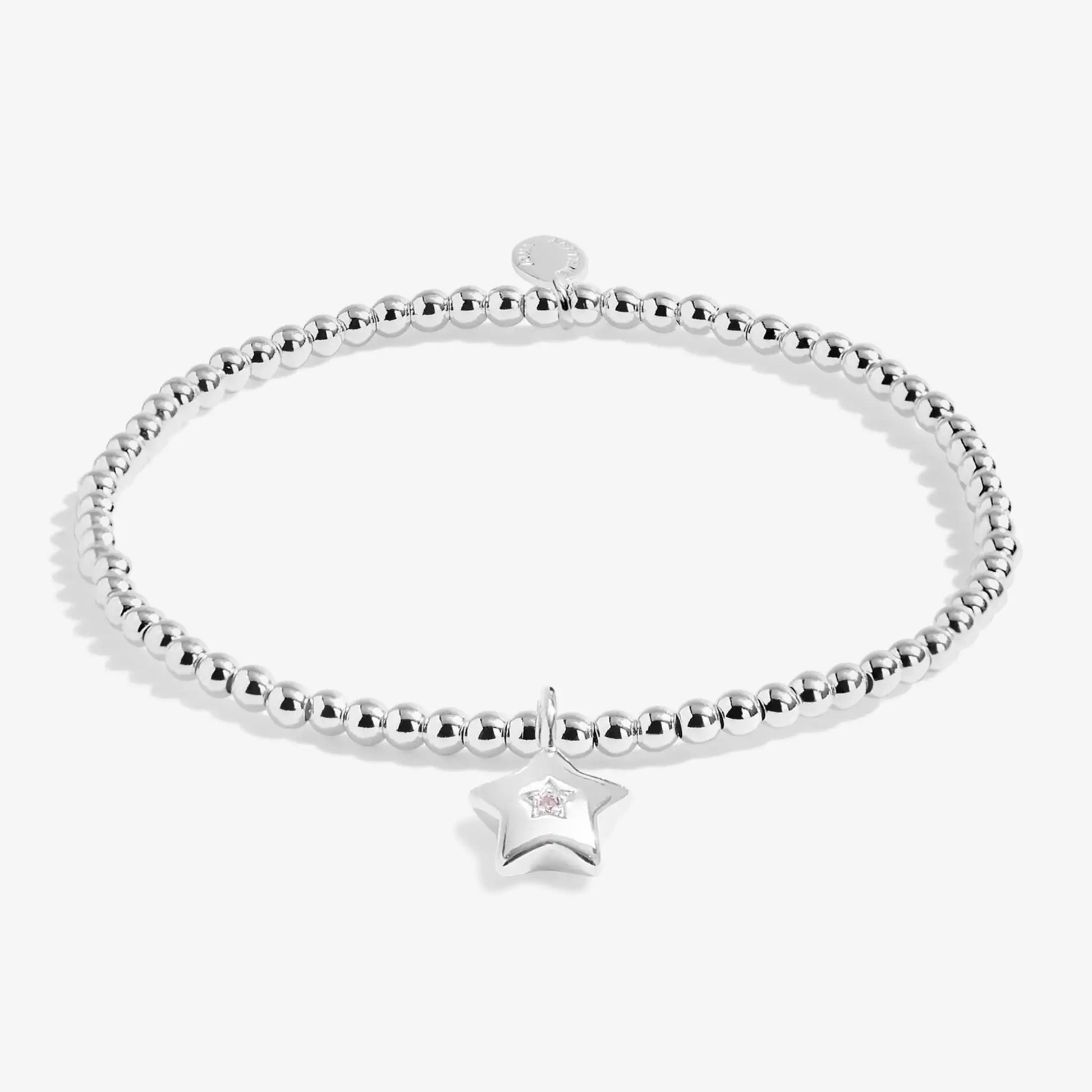 Children's silver beaded bracelet with a star charm set with a purple CZ stone