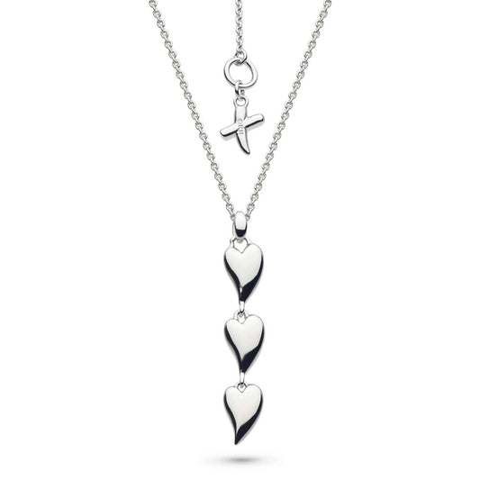 A simple polished silver long triple heart shaped pendant