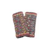 A pair of knitted grey handwarmers with multicolour running leaf patterns.