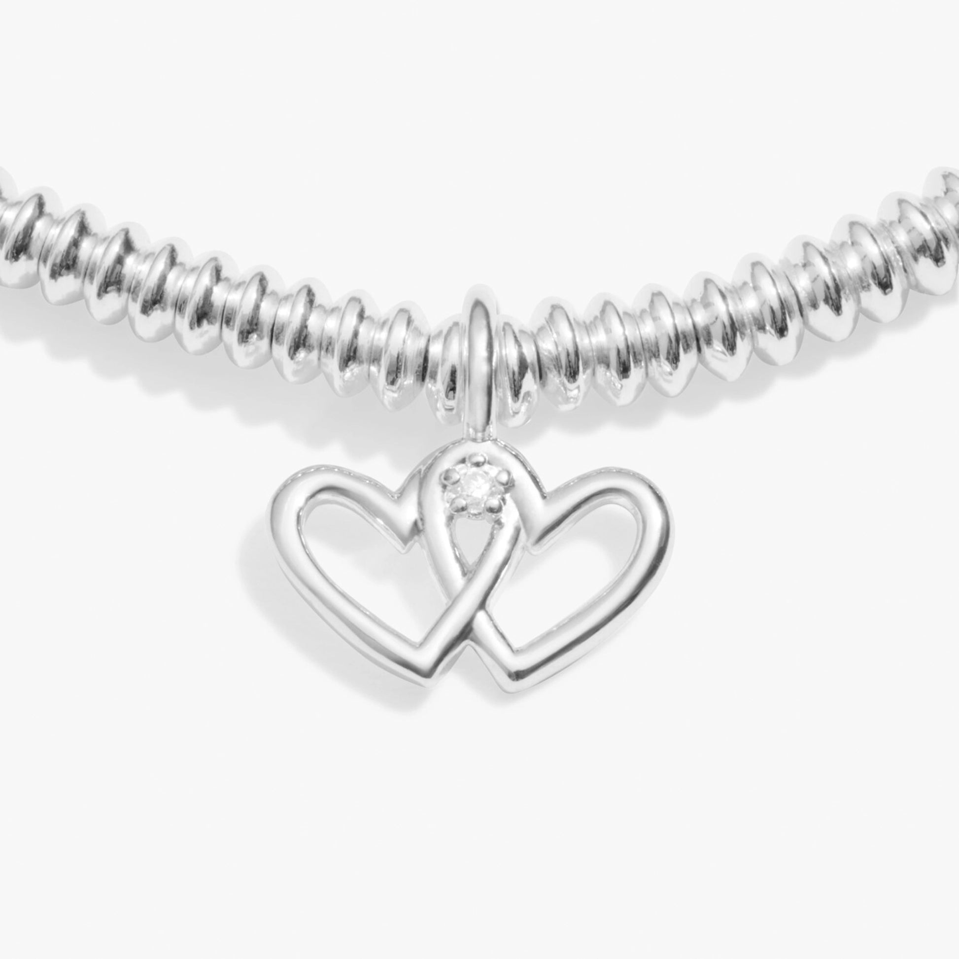 Silver bracelet with double heart charm set with a lab grown diamond detail