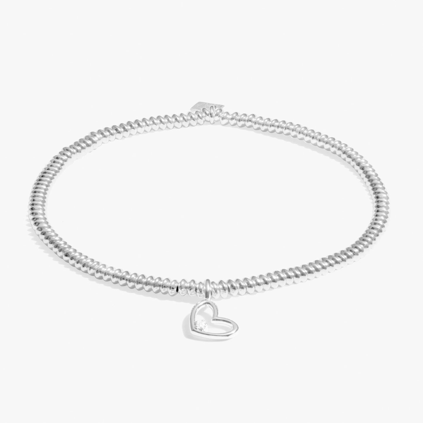 Silver bracelet with heart charm set with a lab grown diamond