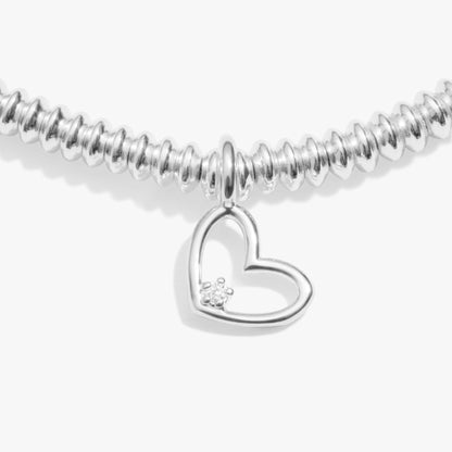 Silver bracelet with heart charm set with a lab grown diamond detail