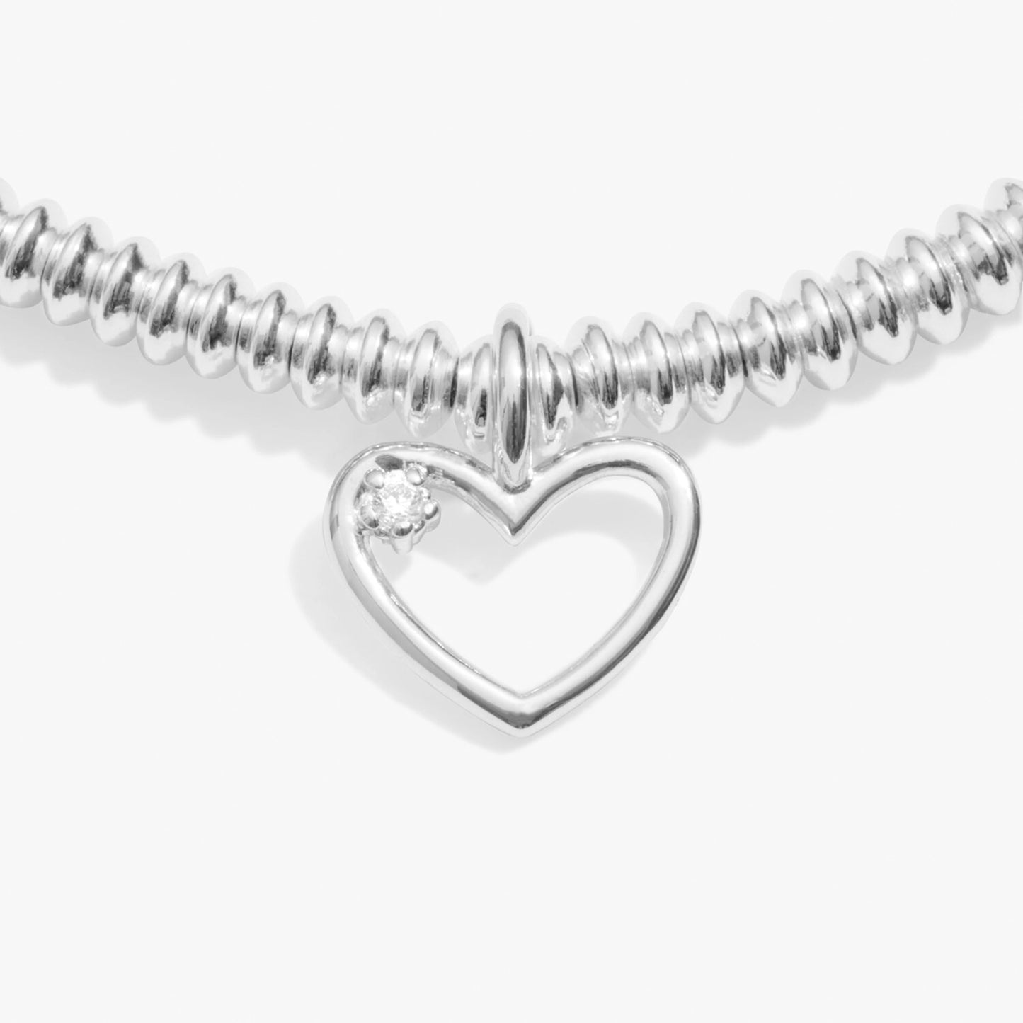 Silver bracelet with heart charm set with a lab grown diamond detail