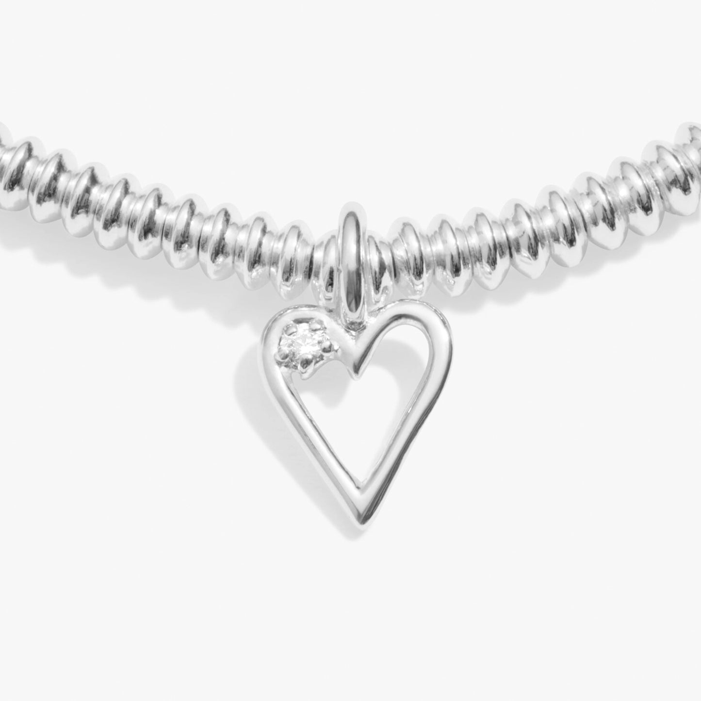 Silver bracelet with heart charm set with a lab grown diamond detail