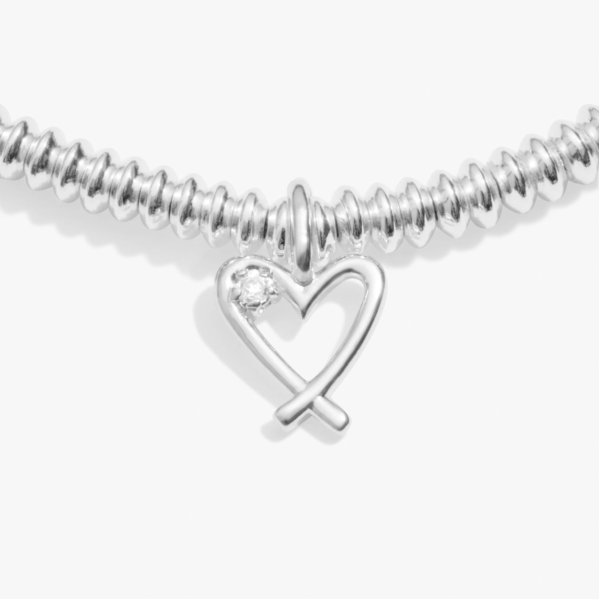 Silver bracelet with a heart charm set with a lab grown diamond detail