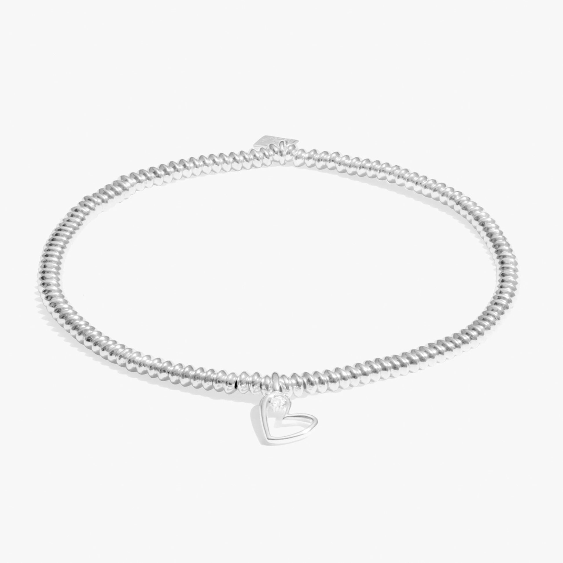Silver bracelet with heart charm set with a lab grown diamond