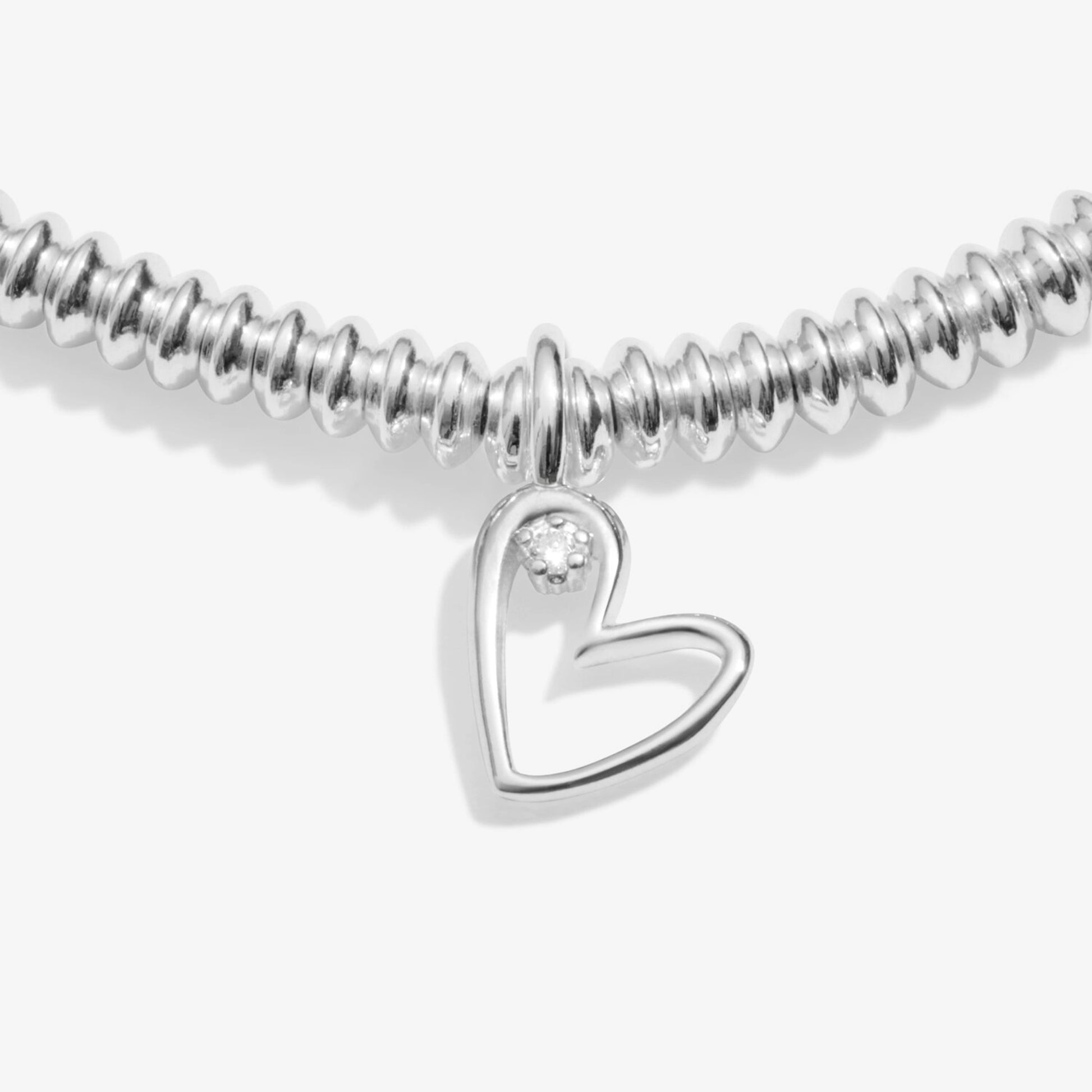 Silver bracelet with heart charm set with a lab grown diamond detail