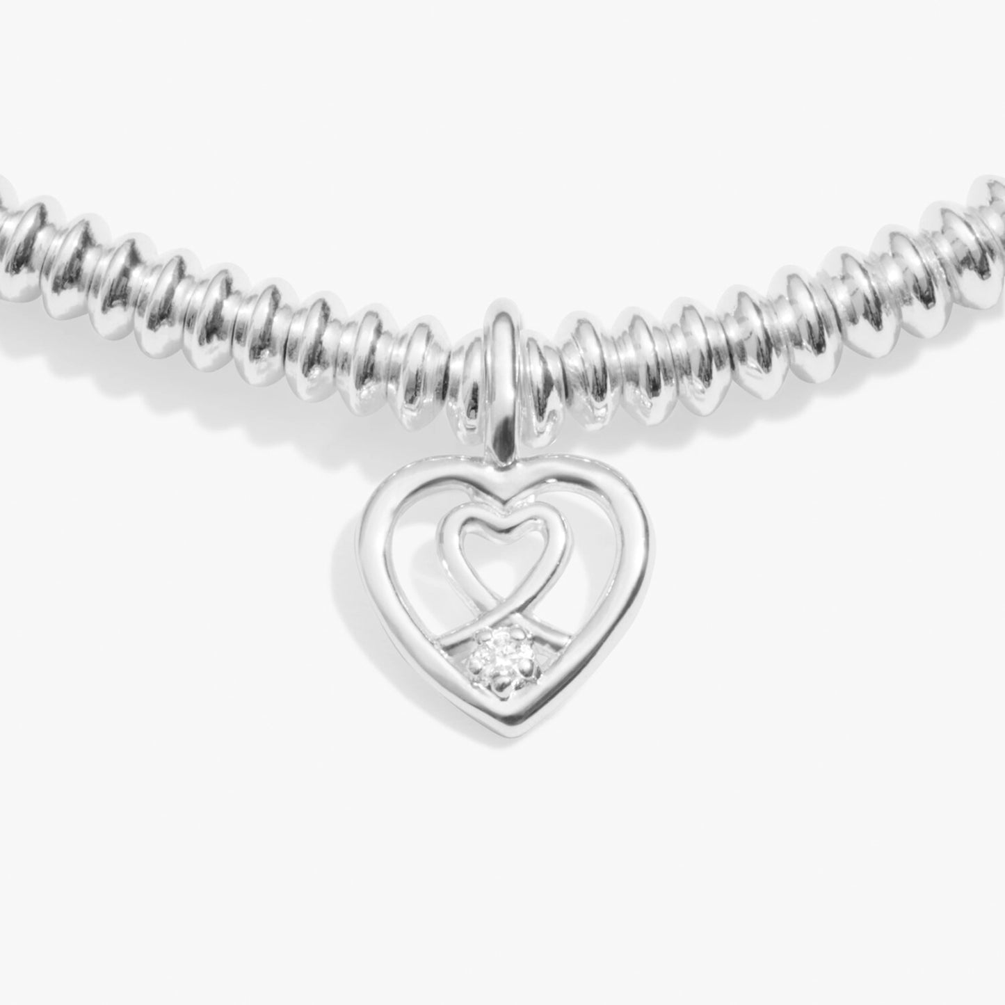 Silver bracelet with a heart inside a heat charm set with a lab grown diamond detail