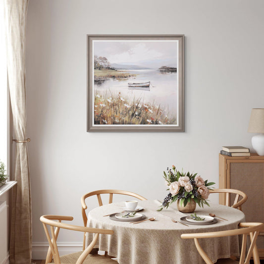 A framed print of a lake with a little fishing boat hanging