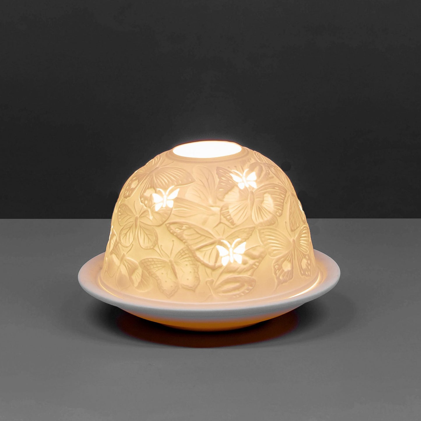 White porcelain tall dome candle holder with engraved butterfly design