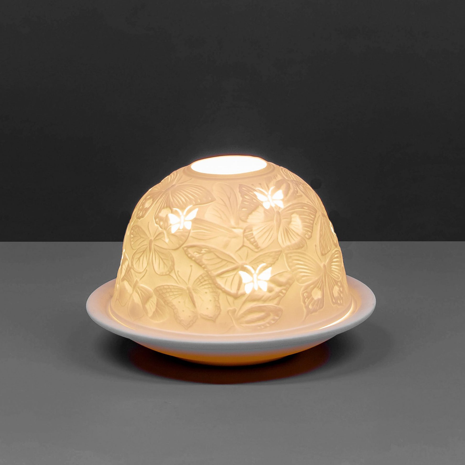 White porcelain tall dome candle holder with engraved butterfly design