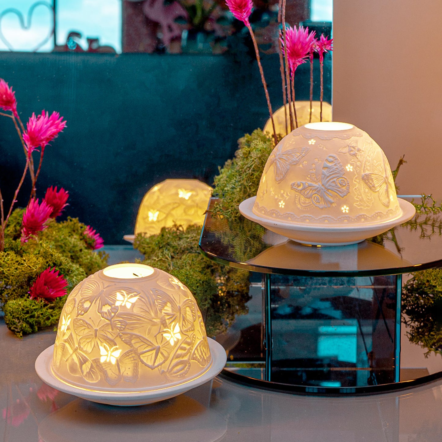 White porcelain tall dome candle holder with engraved butterfly design lifestyle