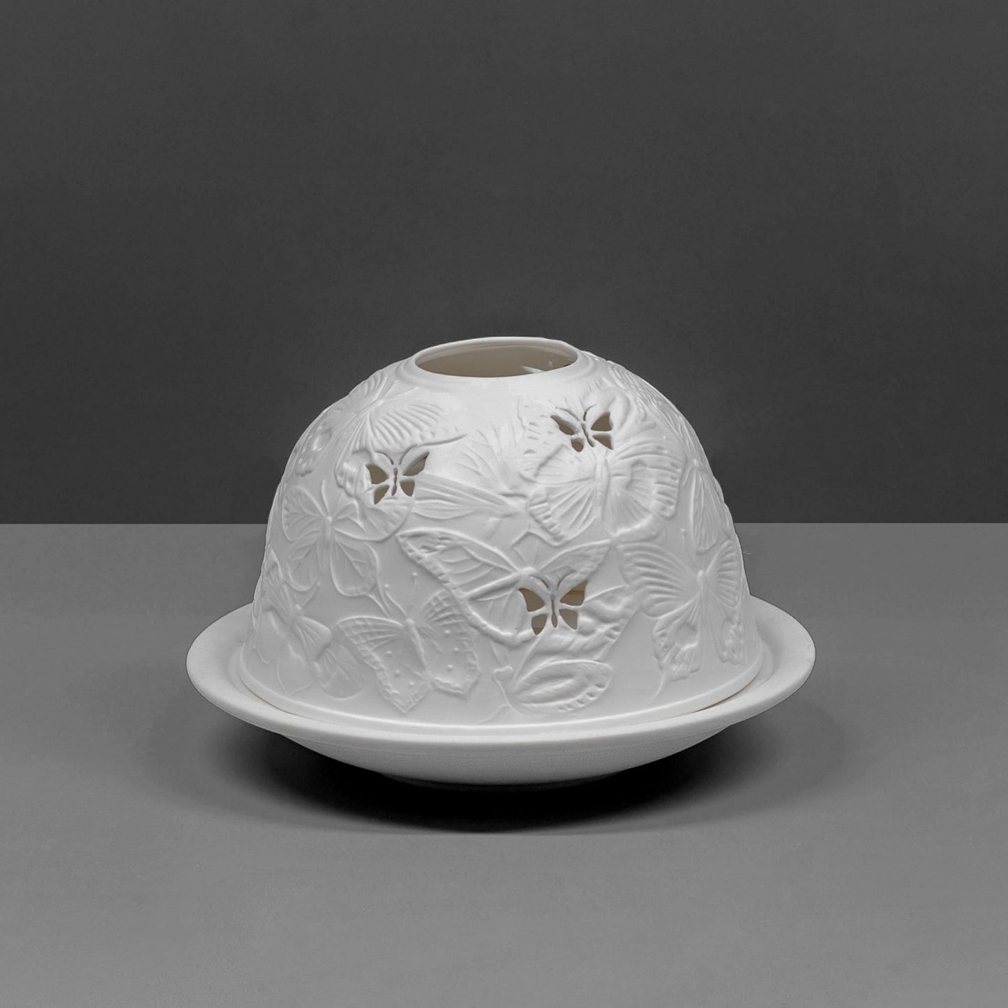 White porcelain tall dome candle holder with engraved butterfly design off