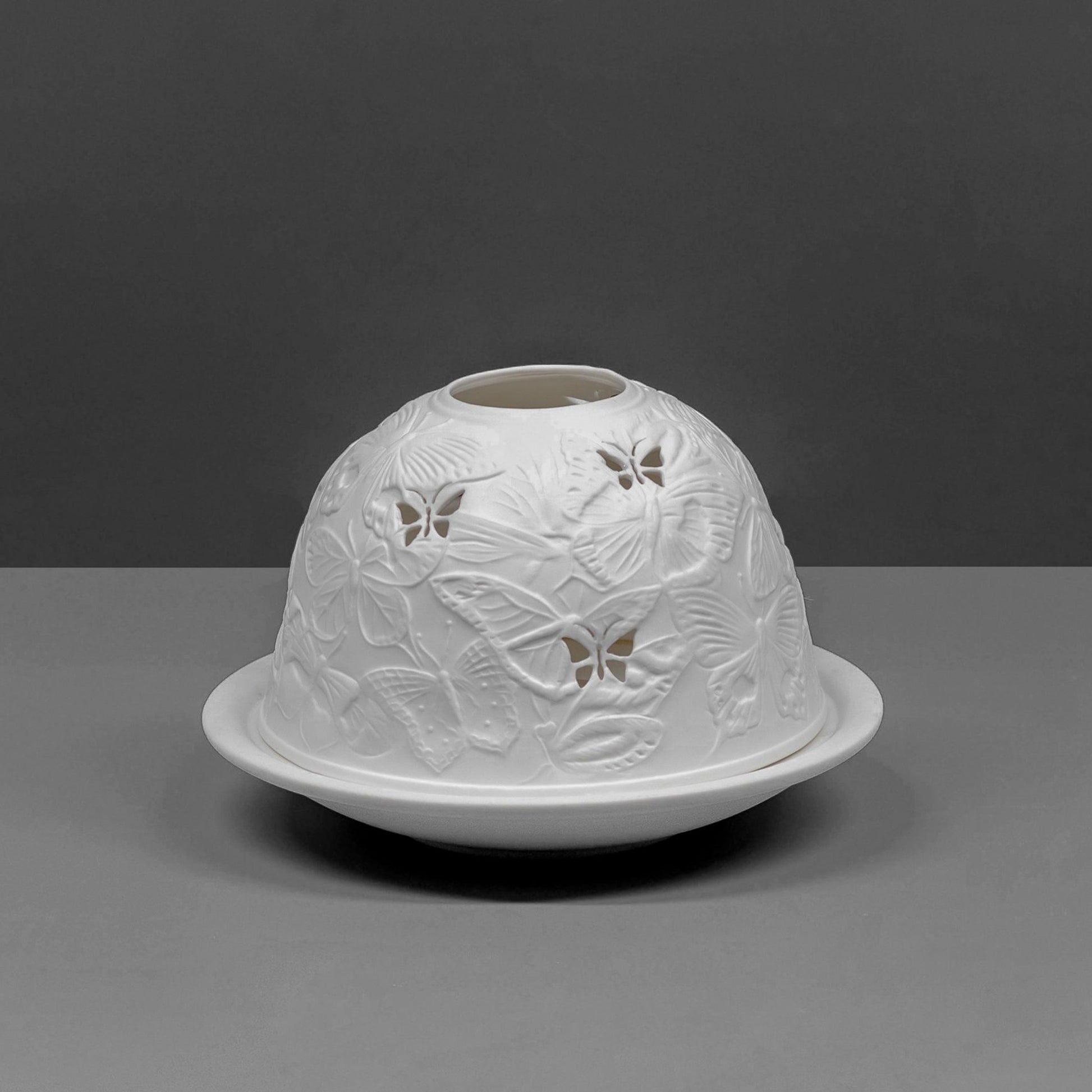 White porcelain tall dome candle holder with engraved butterfly design off