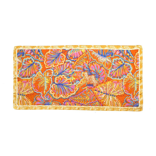Scarf with a bright leaf pattern in blue, pink and orange