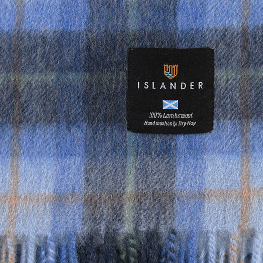 An Islander scarf tag with cleaning instructions