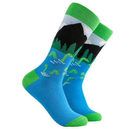 Blue and green socks with loch ness monster design