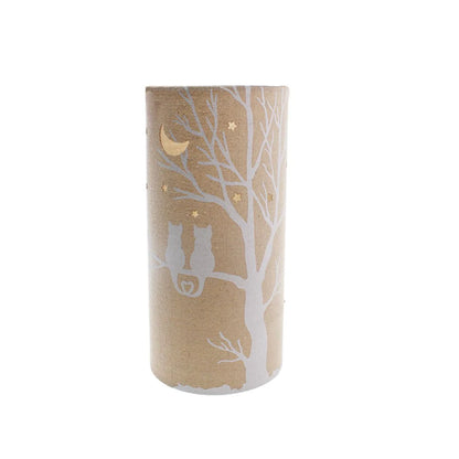 A linen look fabric table lamp with a love cats in a tree design and cut out stars and moon
