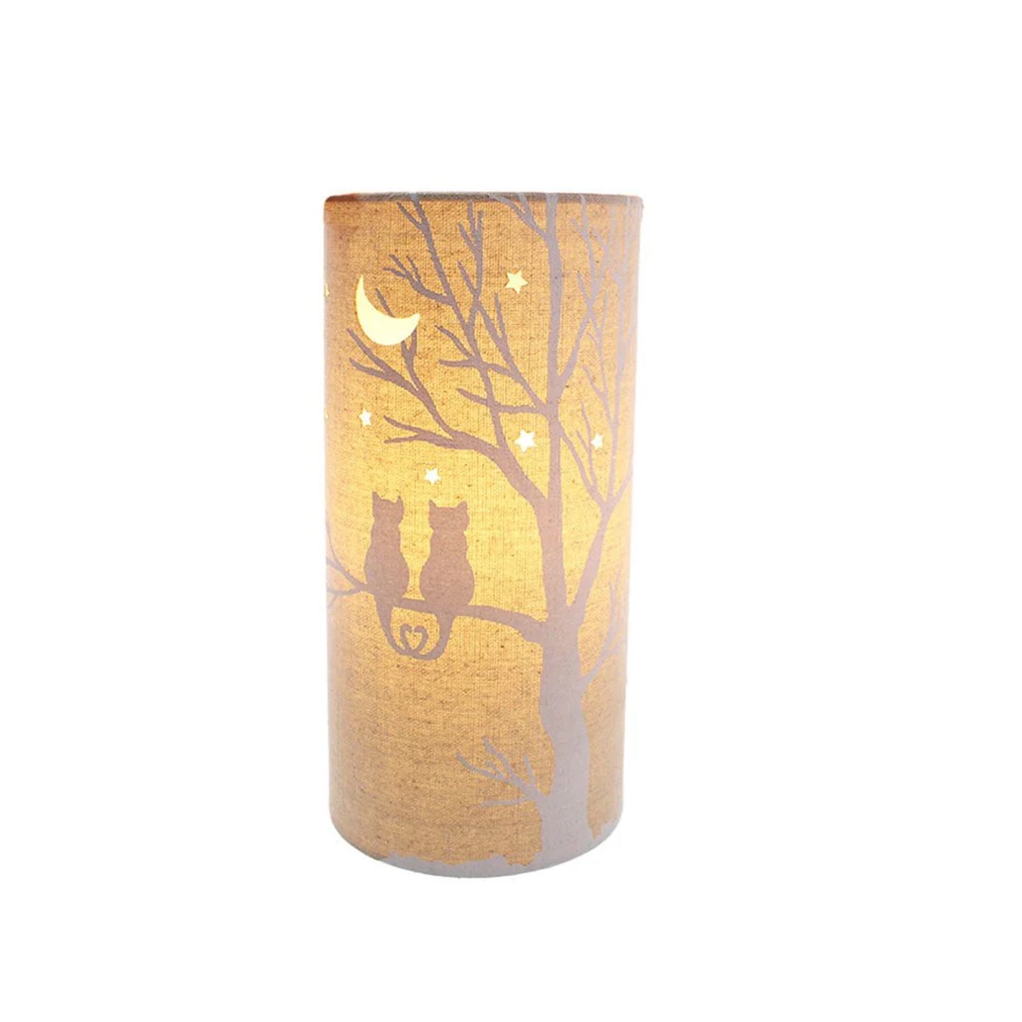 A linen look fabric table lamp with a love cats in a tree design and cut out stars and moon on