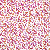 A ditsy heart patterned napkin with pink, purple and orange hearts all over