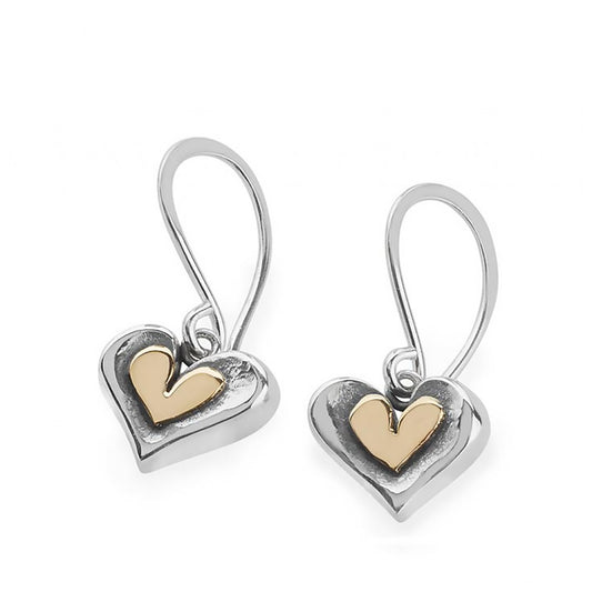 Pair of silver earrings in illustrative heart shapes  with golden heart centres and hook fittings