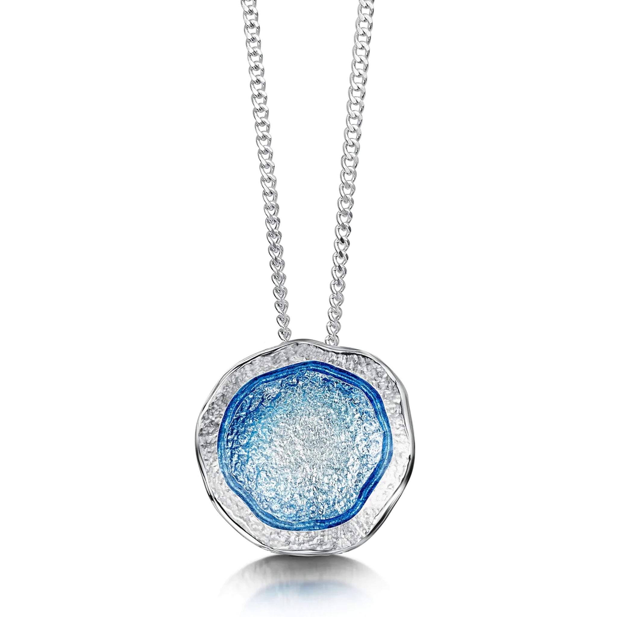 Silver pendant on chain in an irregular, organic shape with subtle texture and blue enamelled centre