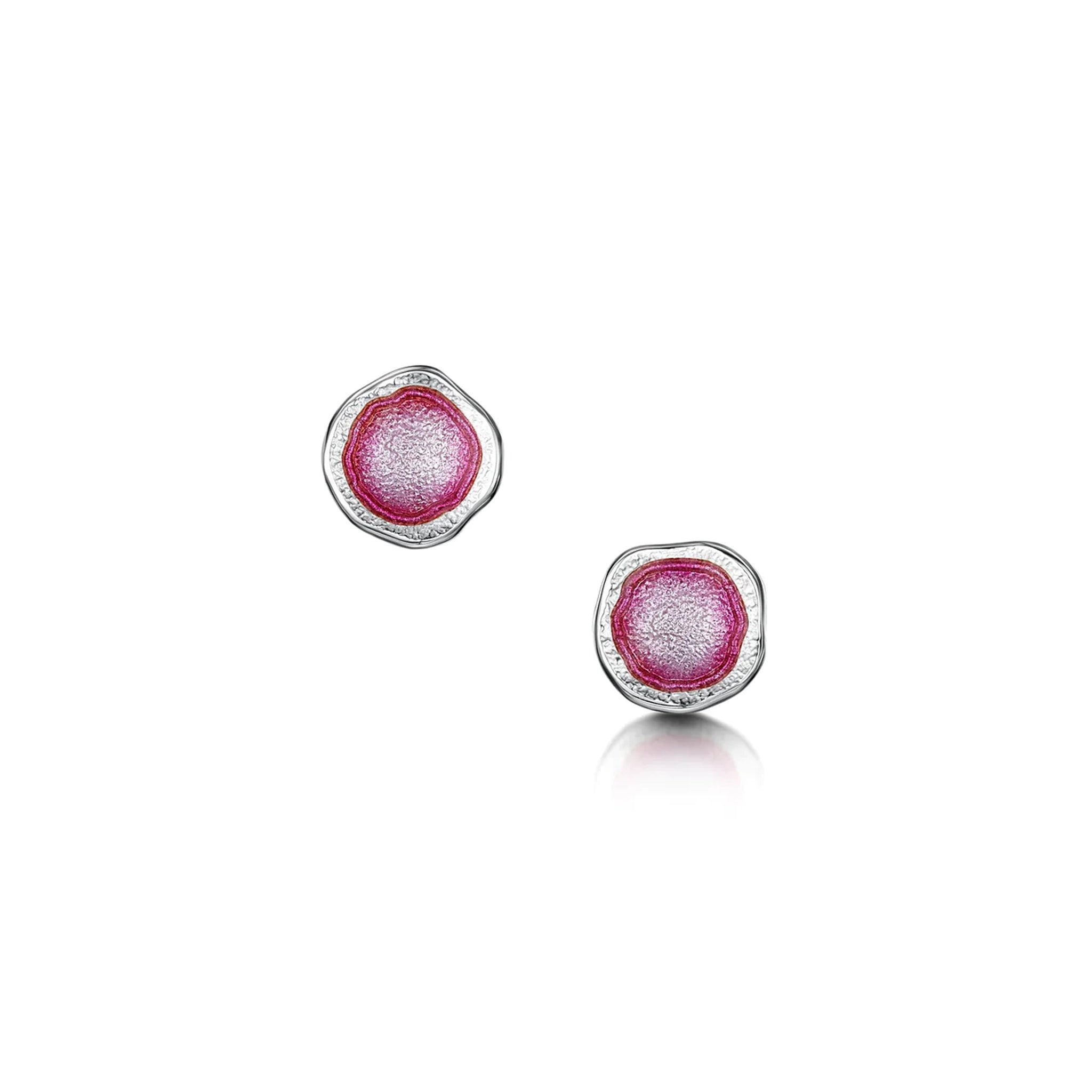 Silver round stud earrings with irregular and organic shape, subtle texture and bright pink enamelled centres