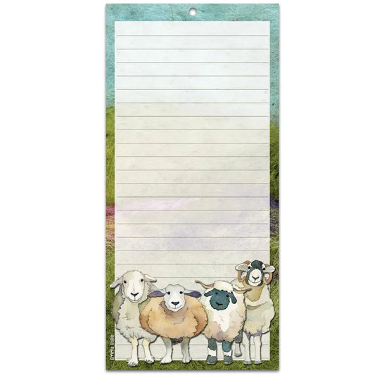 A long notepad featuring an illustration of sheep on a felted landscape background