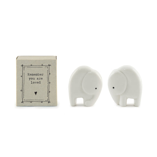 Minimalist white ceramic elephant figurine