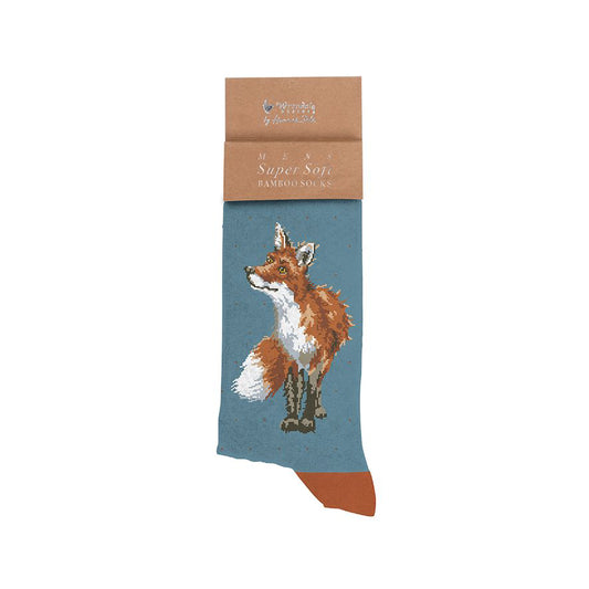A folded pair of denim blue socks with burnt orange heels and an orange fox picture