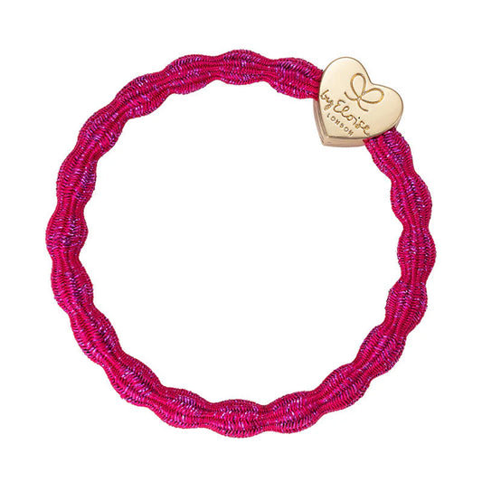 Metallic fuchsia pink coloured bubble shaped hair tie with gold circle charm