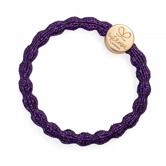 Metallic purple coloured bubble shaped hair tie with gold circle charm