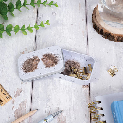 Mini tin fully illustrated with artwork of hedgehogs by Hannah Dale lifestyle