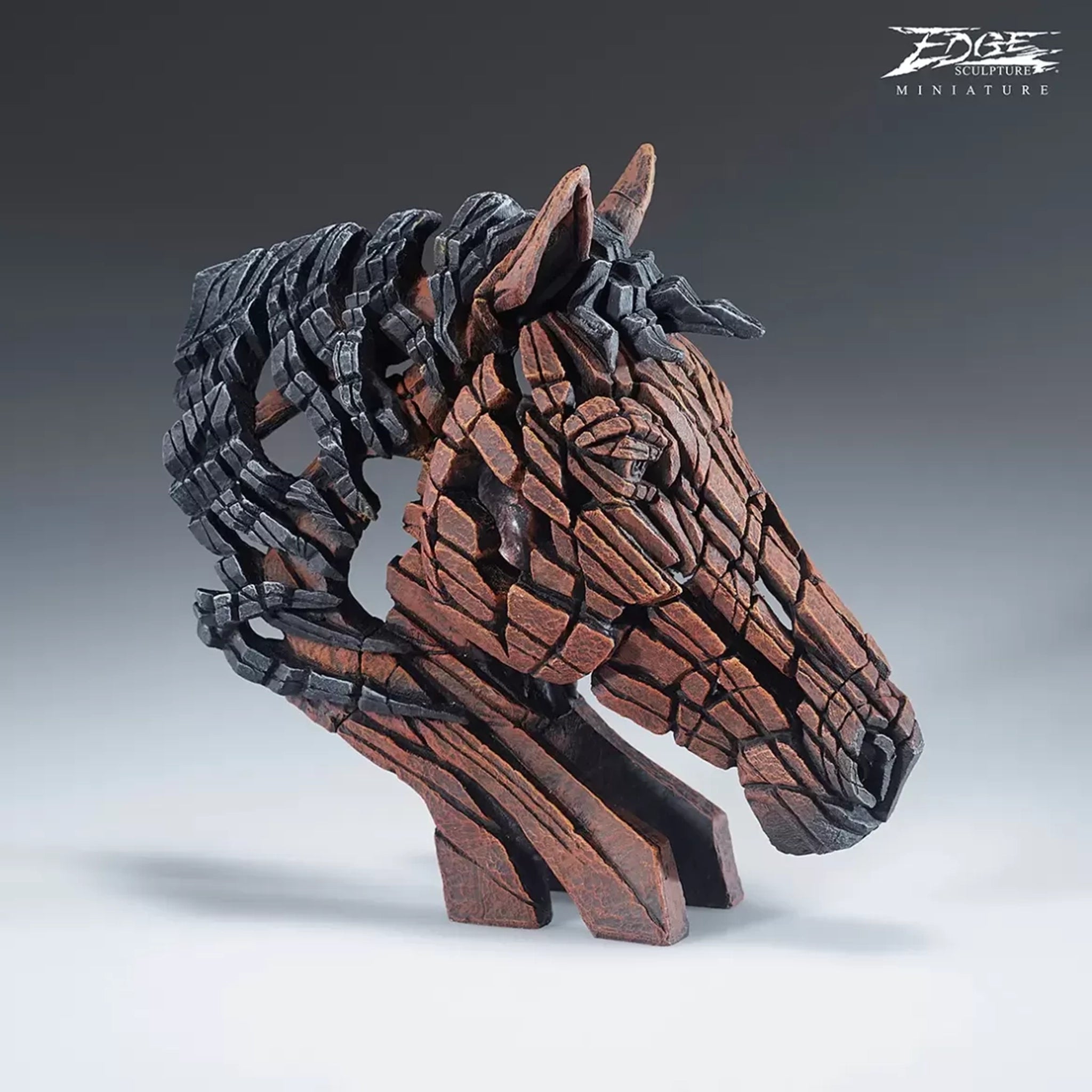 A textured and painted bay horse head bust sculpture