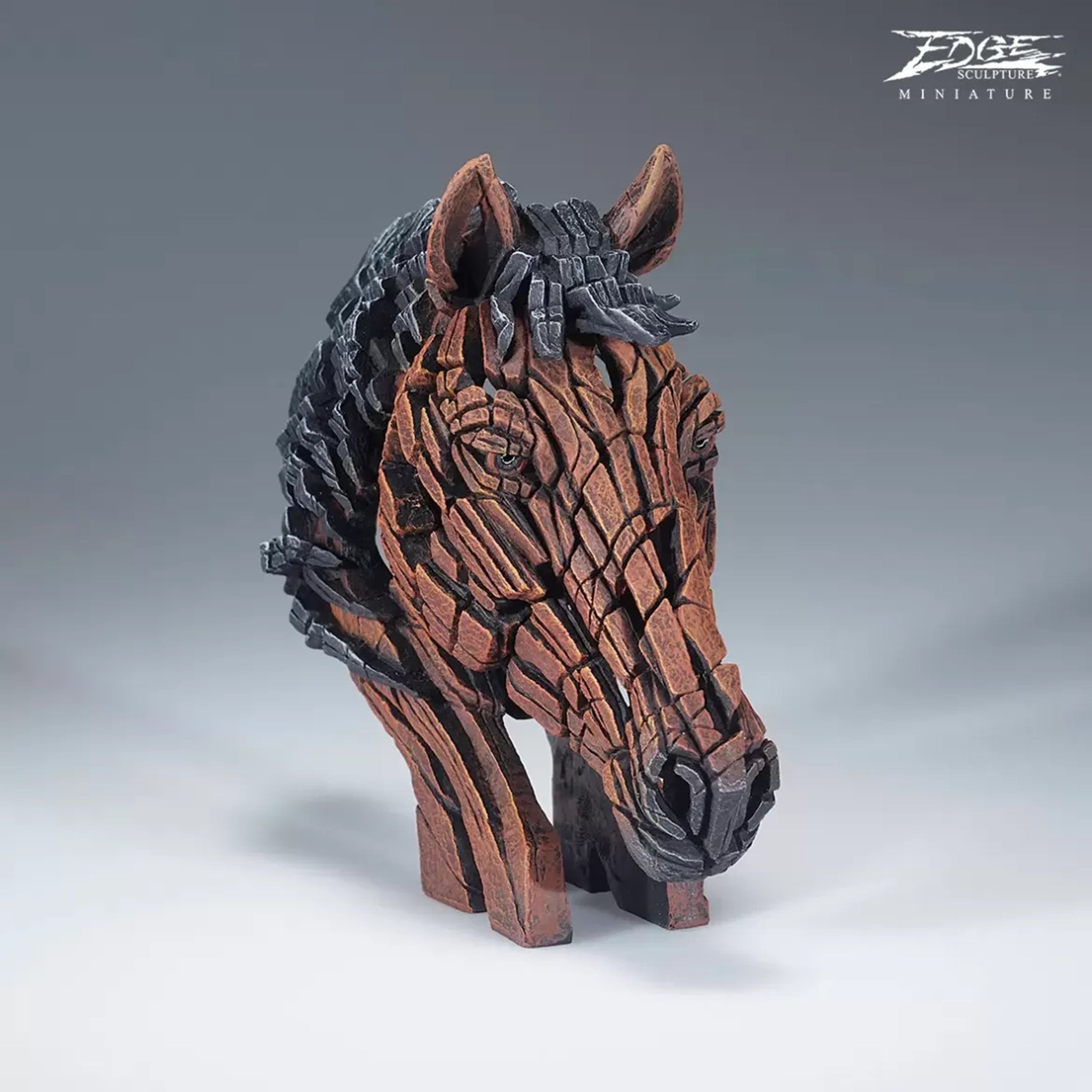 A textured and painted bay horse head bust sculpture front view