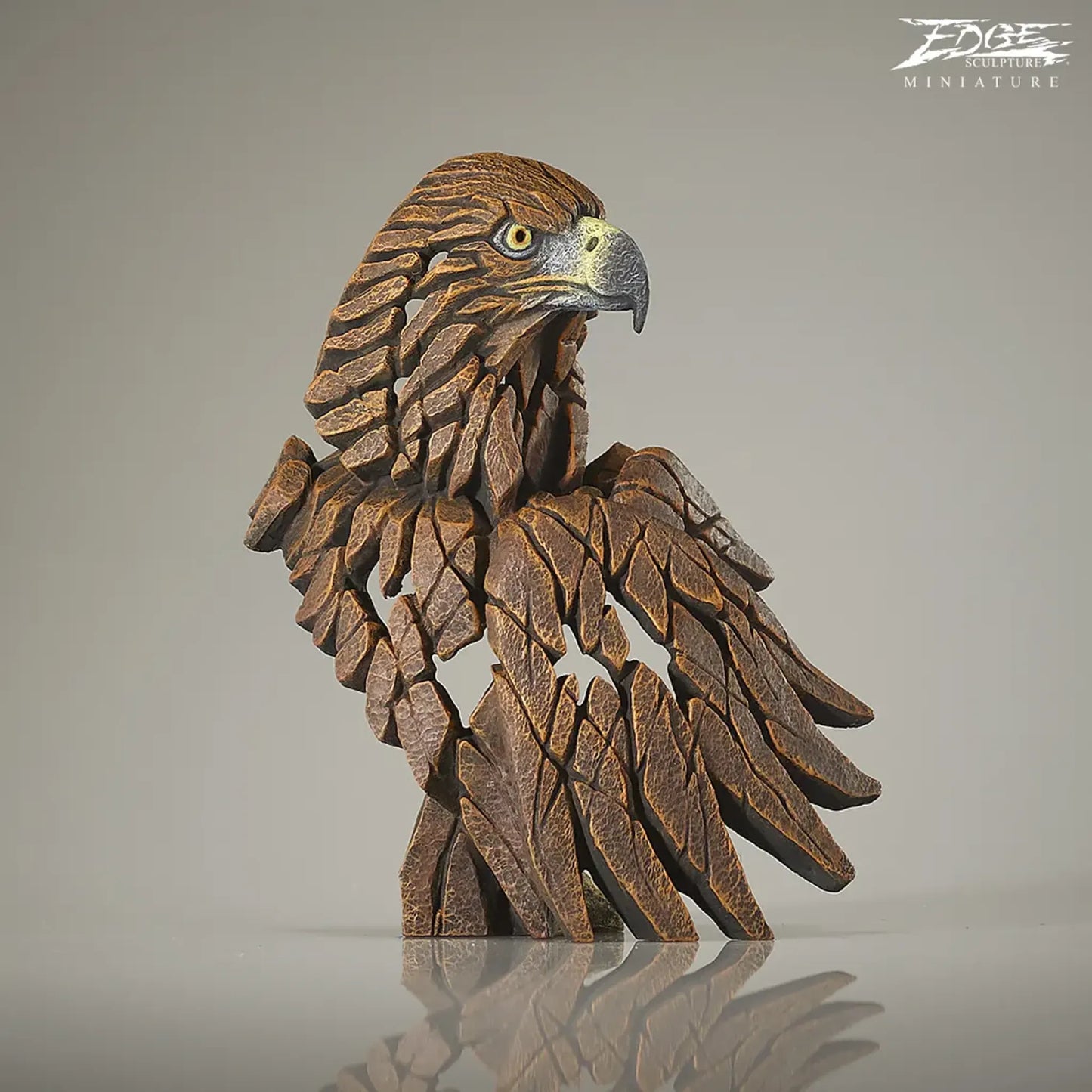 Brown painted golden eagle bust and wing sculpture
