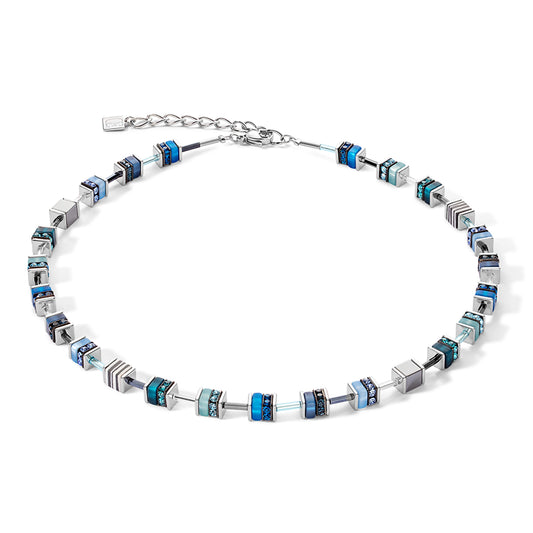 A necklace featuring various stones in cube shapes in grey and blue colours