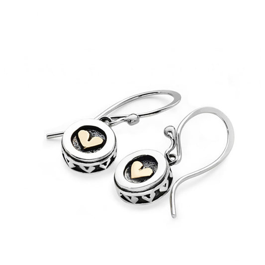 Silver earrings with gold hearts in a round heart decorated frame on hook fittings
