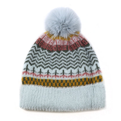 Multi patterned brushed knitted hat with faux fur pompom in aqua, pink and yellow