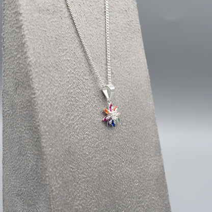 Silver star flower shaped pendant with multicolour CZ stone petals side

