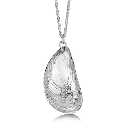 A silver pendant in the shape of a mussel with texture details 