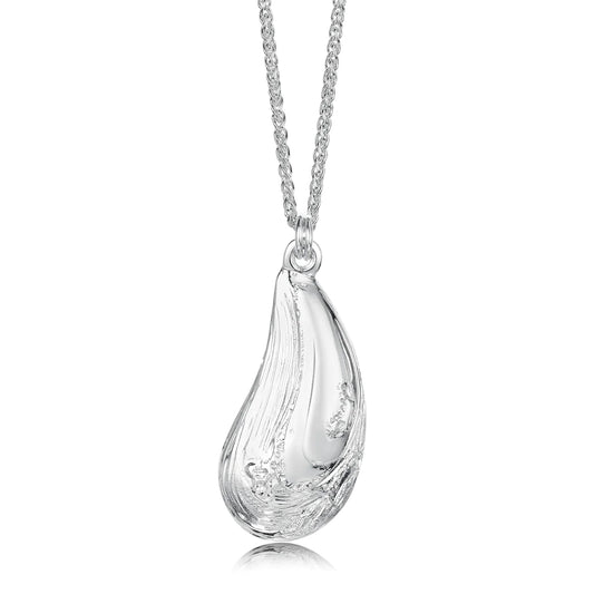 A silver pendant shaped like a mussel shell with intricate textured details on a silver chain