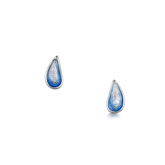 A pair of silver stud earrings shaped like mussels with a gradient blue enamel 