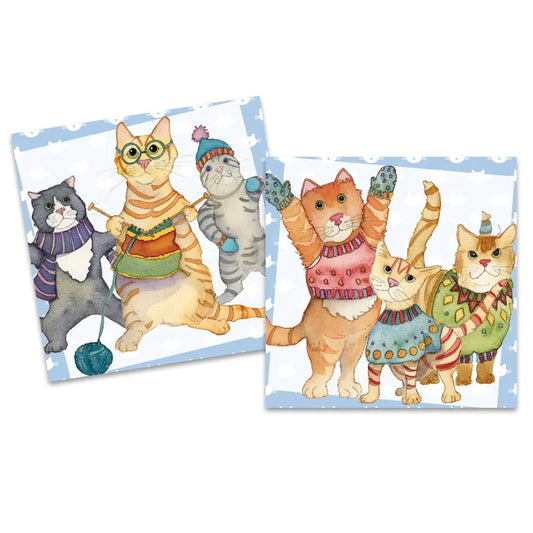 Some square notecards featuring illustrations with cats in winter clothing and knitting