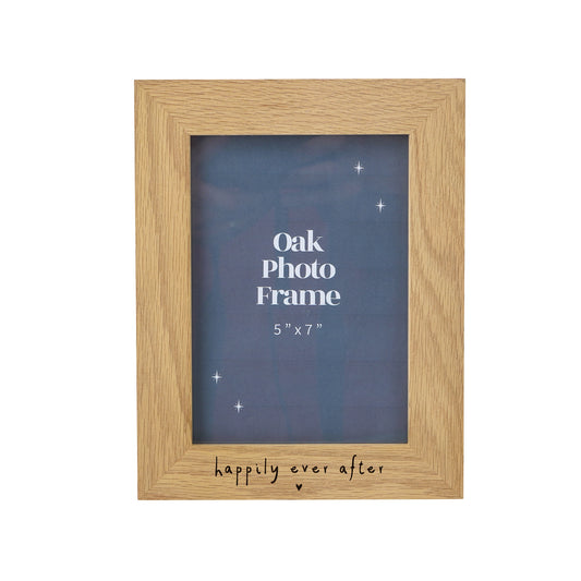 A 6"x7" oak effect photo frame engraved with 'Happily ever after'