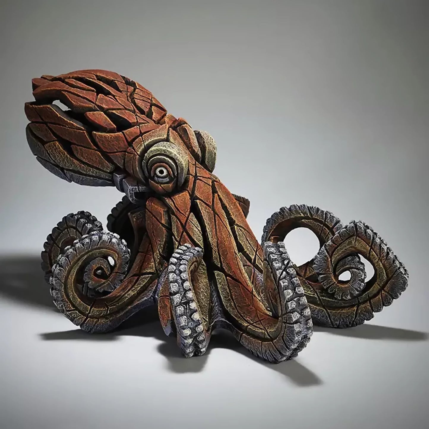 A textured and painted octopus sculpture
