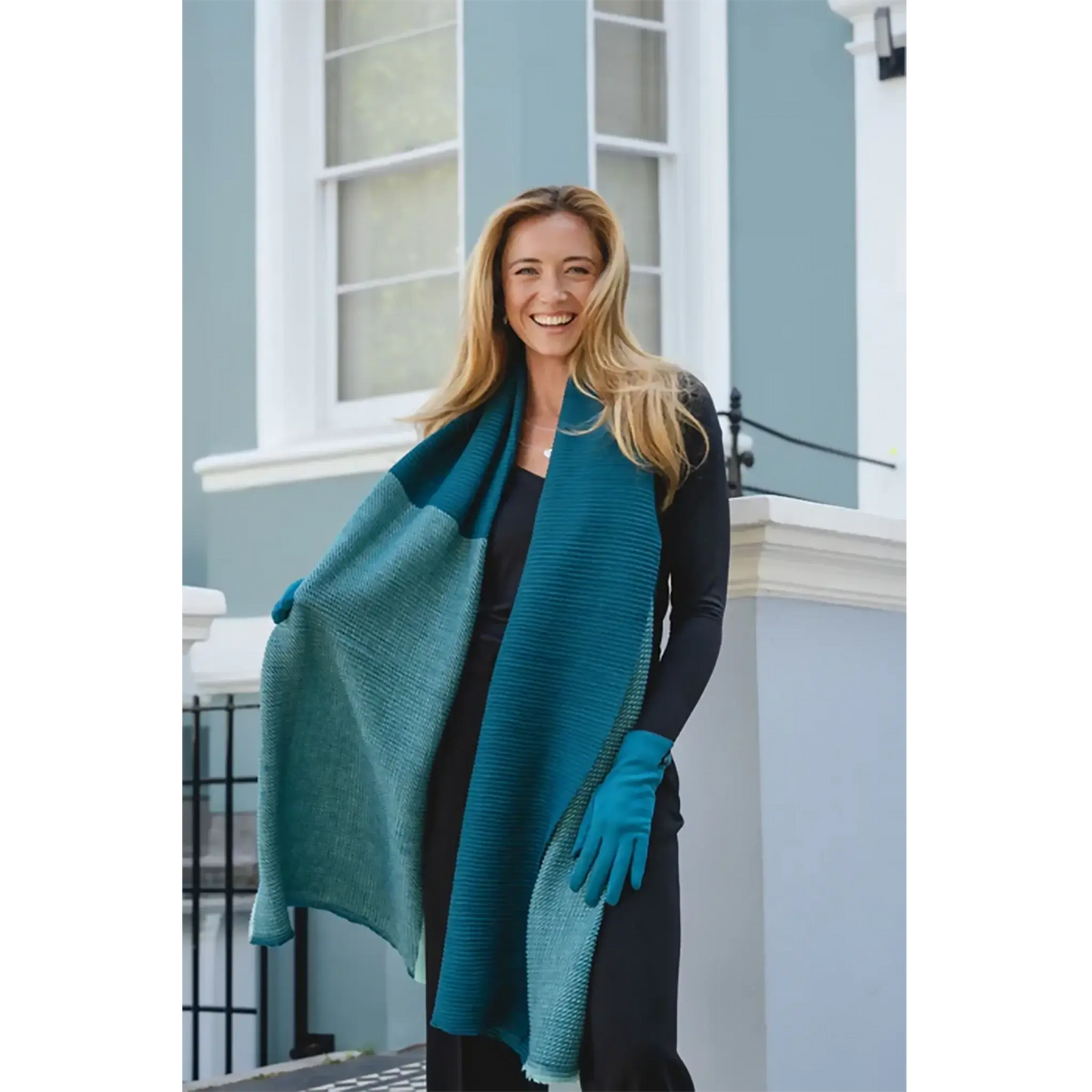 Model wearing ribbed colour block scarf in blue