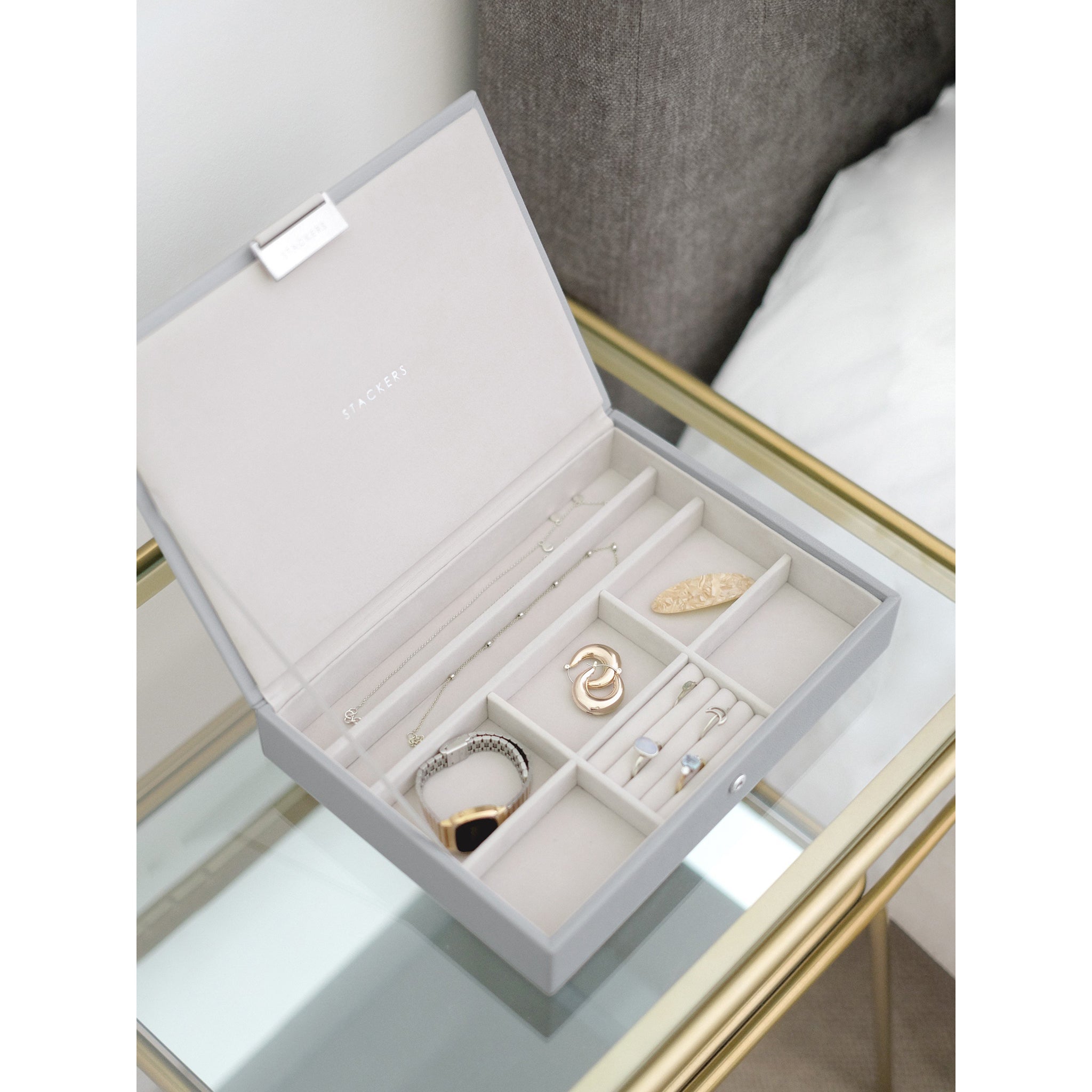 Top of a grey faux leather stacking jewellery box - lifestyle