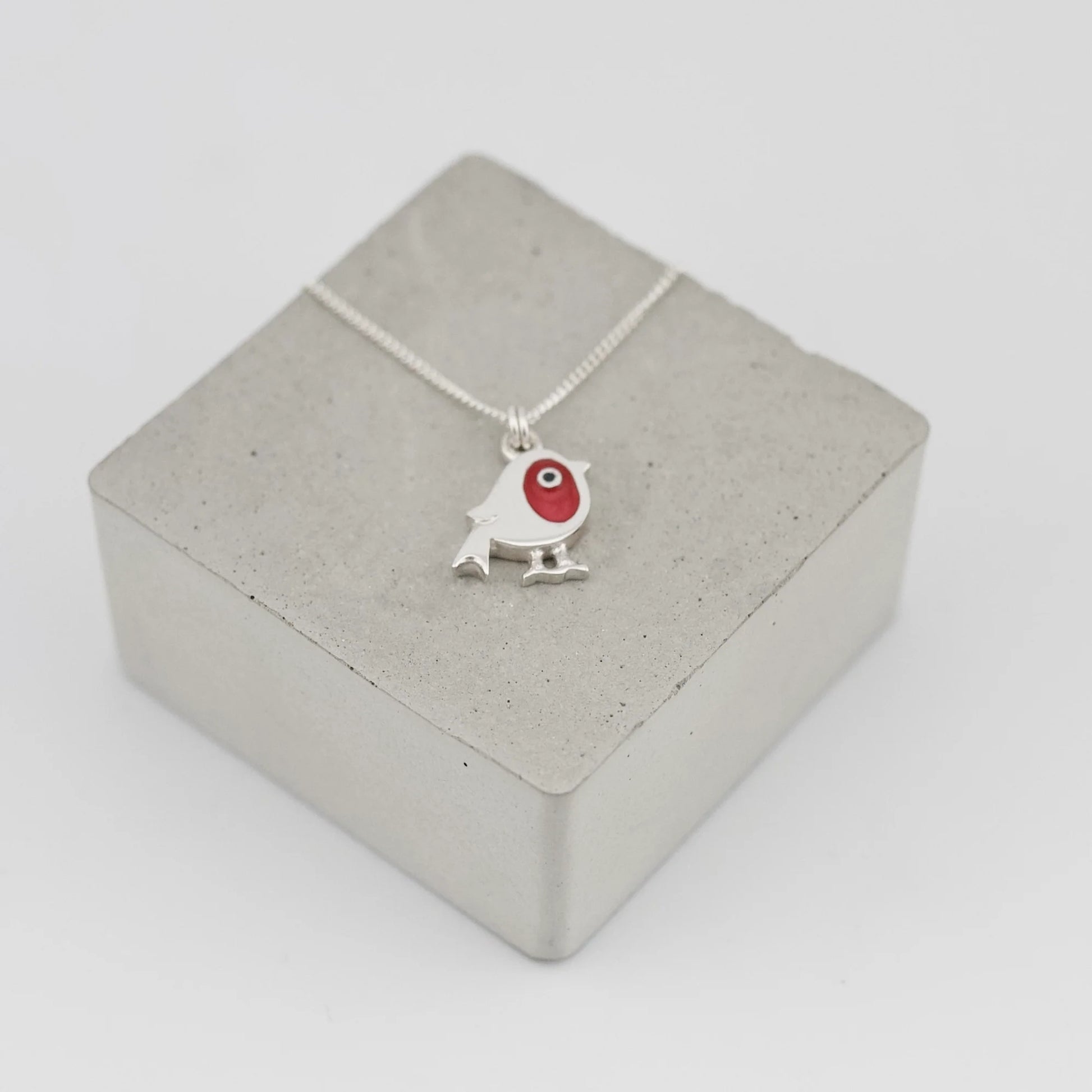 Silver pendant with red enamel robin on silver chain