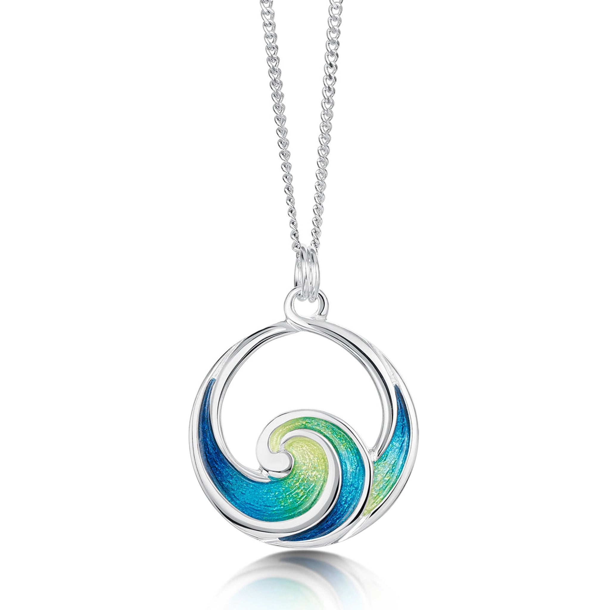 A silver pendant in the shape of an ocean wave coloured with blue and green enamel